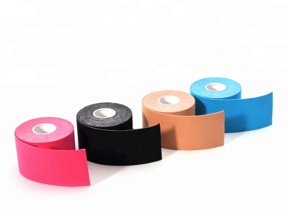 Professional kinesiology tape rolls in multiple colors for athletic support